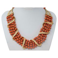 Vintage Kramer multistrand necklace with gilt metal and coral color beads. Stamped on the back, 17 1/2 inches long x 1 1/4 inches wide. Made in the USA, circa 1950-1960. In good condition. Coral Color, Multi Strand Necklace, Metal Necklaces, Vintage Costume Jewelry, Multi Strand, Vintage Costumes, Vintage Necklace, Costume Jewelry, Metallica