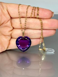 Gorgeous sparkly amethyst heart pendant necklace. The Faceted heart shape pendant is flawless and has a beautiful vivid clear deep purple color that brings lots of depth to the stone and reflects lights beautifully. The pendant is strung on a 14K gold-filled chain. It is perfect for layering or looks great when worn alone. *Excellent qualityAAA+ Flawless Amethyst Heart Shape Pendant (29 ct.) *Pendant measure: 28mmx22 mm /1.1x 0.9 inch *Metal: 14K gold-filled *necklace length: 56 cm /22 inch Soli Rock Crystal Jewelry, Ruby Heart Necklace, Queen Rings, Amethyst Crystal Necklace, Multicolor Jewelry, Amethyst Heart, Amethyst Necklace Pendant, Necklace Amethyst, Necklace Purple