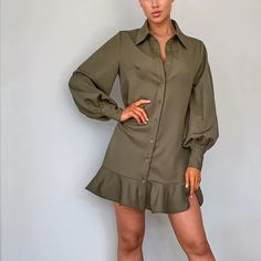 Khaki Frill Hem Shirt Dress Update Your New Season Wardrobe With This Must-Have Shirt Dress. Featuring A Khaki Material With A Button-Up Design And Cute Frill Hem, Wear This Dress With Strappy Heels And Hooped Earrings For A Look That We Are Loving. Length Approx 89cm/35" (Based On A Sample Size Uk 8) Model Wears Size Uk 8/ Eu 36/ Aus 8/ Us 4 Model Height - 5ft 6” Fabric & Care 35% Cotton 65% Polyester Please Note: Due To Fabric Used, Color May Transfer Puff Sleeve Shirt Dress With Buttons For Work, Khaki Long Sleeve Dress For Day Out, Single-breasted Long Sleeve Summer Dress, Single Breasted Long Sleeve Summer Dress, Casual Fitted Shirt Dress With Puff Sleeves, Long Sleeve Single Breasted Mini Dress For Date Night, Single Breasted Long Sleeve Dress For Date Night, Workwear Mini Dress With Puff Sleeves And Buttons, Puff Sleeve Mini Dress For Work With Buttons