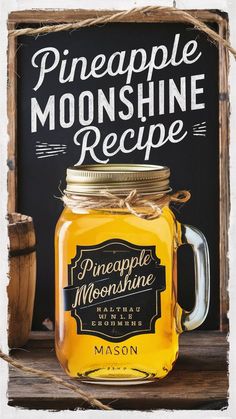 a mason jar filled with pineapple moonshine recipe sitting on top of a wooden table