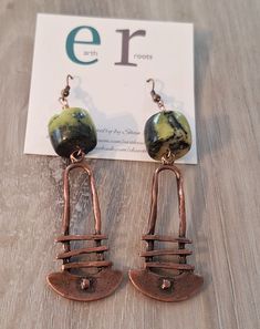 These boho style earrings feature abstract copper dangles with yellow turquoise gemstone beads. These earrings measure 3.5" in length.  They will ship in a gift box or bag via USPS with tracking info provided. Artsy Copper Drop Earrings, Artsy Copper Dangle Earrings, Artsy Copper Jewelry With Matching Earrings, Bohemian Bronze Earrings With Copper Wire, Green Bohemian Earrings With Copper Wire, Bohemian Green Earrings With Copper Wire, Green Bohemian Copper Wire Earrings, Turquoise Artisan Electroformed Earrings, Bohemian Brown Electroformed Earrings