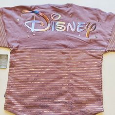 Walt Disney World 50th Anniversary, Disney World 50th Anniversary, Disney Baby Clothes, Disney Logo, Disney Sweaters, Spirit Jersey, Back Shoulder, Horizontal Stripes, Disney Outfits