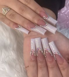 Long French Tip With Gems, Long French Tips With Diamonds, Long White French Tip Nails With Gems, Blinged Out French Tip Nails, Long White Acrylic Nails With Charms, White French Tip Nails With Butterfly Charm, Blue Acrylic Nails, Lovely Nails, Ombre Acrylic Nails