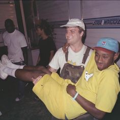 two young men sitting next to each other