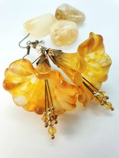 Large Sunflower Yellow Lucite Flower Earrings ~ Mermaid Flowers ~ Handmade Flower Earrings, Boho Hippy Bohemian Style Earrings, Unique Gift For Her. ~ Mermaid Flowers ~  ♡ These rather gently painted Lucite earrings are my biggest range. This vibrant pair has been made with little Swarovski crystals in Sunflower Yellow and Buff, paired with sparkling Citrine. To paint these I have used hues of Sunfliwer Yellow, Mustard and Lemon Yellow, with a lightly applied gold along the petal edges. Mixed me Lucite Flower Earrings, Bohemian Floral, Hippie Bohemian, Unique Gifts For Her, Floral Earrings, Floral Style, Boho Stil, Bead Caps, Handmade Flowers