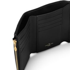 LOUIS VUITTON® - Capucines Compact Wallet - Black Luxury Compact Wallet, Luxury Black Compact Trifold Wallet, Luxury Black Trifold Wallet With Coin Pocket, Luxury Black Trifold Wallet For Evening, Louis Vuitton Capucines, Compact Wallet, Luxury Wallet, Louis Vuitton Official, Small Wallet