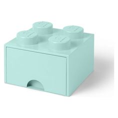 a small blue lego box with four knobs