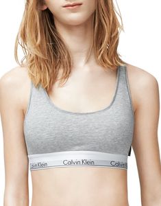 PRICES MAY VARY. LESS IS MORE: Unlined and underwire-free, this Calvin Klein bra combines the label’s famously sporty-sexy look with the feel of a favorite tee. MODERN COTTON: Spun in premium cotton yarns with silky modal and a hint of stretch, CK’s signature bras for women are lightweight, super-soft and breathable. EFFORTLESS: An easy, pullover raceback silhouette makes dressing stress-free. SUPER-SOFT: Smooth and lightweight, this wireless bra for women has an ultra-soft, flexible band that r Best Bra, Calvin Klein Sports Bra, Calvin Klein Bra, Grey Calvin Klein, Cotton Bralette, Calvin Klein Women, Bra Panty, Calvin Klein Woman, Bustiers