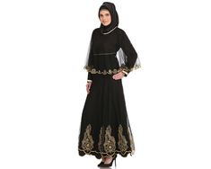 NAZUK BLACK CREPE & NET ABAYA Item Details: Cape design Anarkali style black abaya with golden zari work to give you a mind-blowing and heart catchy looks. -Round neckline with contrast color binding. -Attached embroidered net cape. -Straight sleeves. -Dual layer. -Flared embroidered panels all round for ease of movement. -Matching Square Hijab (100*100 cm) and Band Included. Specifications: Colour: Black Fabric: Crepe, Plain Net & Flower Net (100% polyester) Care: Hand Wash with like colors. Pl Black Embroidered Long Sleeve Gown, Black Long Sleeve Embroidered Gown, Traditional Black Gown With Dabka Work, Black Embroidered Semi-stitched Gown, Black Bollywood Long Sleeve Gown, Fitted Black Abaya For Wedding, Black Bollywood Gown With Long Sleeves, Black Long Sleeve Bollywood Gown, Black Long Sleeve Gown For Festive Occasions