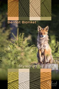 an animal sitting on top of a wooden stump in front of some grass and trees