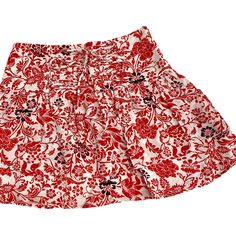 White Red Black Floral Pull-On Layered Mini Skirt Adjustable Tie Front Detail Hidden Size Zip Closure Fully Lined Lightweight Made In Usa Women's Size Small, Medium, Large Approximate Flat Lay Measurements: Sm: 13" Waist 15" Length Md: 14" Waist 15.5" Length Lg: 15" Waist 16" Length 100% Rayon Brand New Boutique Mini Skirt Without Tags From Wholesaler. Individually Packaged. Red Floral Print Flared Skirt, Chic Red Floral Print Mini Skirt, Chic Red Mini Skirt With Floral Print, Red Tiered Skirt With Floral Print, Red Floral Print Tiered Skirt, Red Relaxed Skort For Summer, Red Pleated Mini Skirt For Summer, Red Relaxed Fit Skort For Summer, Red Flowy Mini Skort