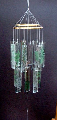 a wind chime that has plants in it