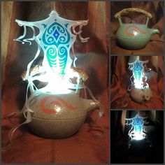 the light up teapot has an intricate design on it