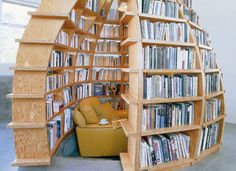 a wooden book shelf filled with lots of books