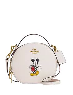 Smooth leatherTwo credit card slotsDouble zip closure, fabric liningTop handle with 1 1/4" dropDetachable strap with 23 1/4" drop for shoulder or crossbody wear6 3/4" (L) x 6" (H) x 2 1/2" (W)Disney x Coach©DisneyStyle No. CM856Color: Chalk Multi Leather Canteen, Coach Disney, Disney Bag, Disney Shop, Coach Outlet, Coach Shoulder Bag, Coach Leather, Disney Style, Brunei