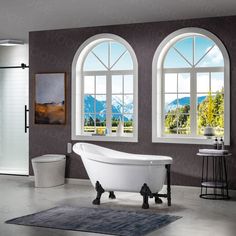 a bathroom with three windows and a bathtub