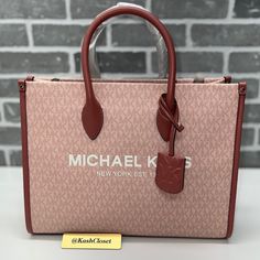 100% Guaranteed Authentic Michael Kors !! **Firm On Price ** Details : Tote Bag Gold-Tone Hardware Dimensions: 13.75”W X 10.75”H X 4.75”D Approx Handle Drop: 4.5” Adjustable Strap: 15”-25” Interior Details: Back Zip Pocket, Front Slip Pocket Lining: 100% Polyester Zip Fastening Imported Color : Dk Powder Blush Multi Size : Medium Msrp : $558 **Comes From Smoke & Pet Free Environment ** #Mk #Michael Kors #Wallet #Wristlet #Designerbag #Leather #Newcollection #Gift #Kashcloset #Collection #Giftset Pink Top Handle Bag In Coated Canvas, Pink Coated Canvas Top Handle Bag, Designer Pink Coated Canvas Bag, Logo Coated Canvas Shopping Bags, Michael Kors Coated Canvas Shopping Bags, Pink Coated Canvas Bag With Removable Pouch, Pink Coated Canvas Top Handle Shoulder Bag, Pink Coated Canvas Shoulder Bag With Top Handle, Pink Coated Canvas Bag For Everyday Use