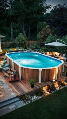 an above ground pool surrounded by wooden decking and patio furniture with lights around it