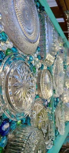 many glass dishes and bowls are on display