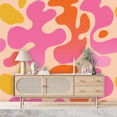 an abstract wallpaper design with pink, orange and yellow colors in the living room