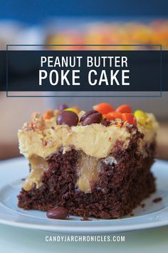 a close up of a piece of cake on a plate with the words peanut butter poke cake