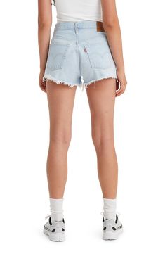 Shredded hems and a bleached-out light wash add to the vintage vibe of nonstretch-denim shorts in the iconic 501 silhouette. 2 1/2" inseam; 24" leg opening; 11" front rise; 13 1/2" back rise (size 29) Button fly Five-pocket style 100% cotton Machine wash, tumble dry Made in Turkey Levi's Relaxed Fit Cutoff Shorts, Levi's Cotton Cutoff Shorts, Levi's White Cutoff Shorts, Levi's Blue Cutoff Shorts, Levi's Medium Wash Jean Shorts With Built-in Shorts, Levis 501 Original, Levis 501, Cut Off Shorts, Cut Off