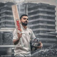 a man with a beard holding a baseball bat and helmet in front of a cityscape