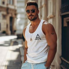 Season:Spring  Summer; Fabric:100% Cotton; Sleeve Length:Sleeveless; Look After Me:Washable,Wet and Dry Cleaning; Gender:Men's; Style:Outdoor,Casual,Fashion; Elasticity:Micro-elastic; Tops Type:T shirt Tee,Undershirt,Tee Top; Occasion:Street,Casual,Daily; Age Group:Adults; Fit Type:Regular Fit; Pattern:Graphic,Letter; Design:Print; Neckline:Crew Neck; Brand:Ador; Front page:FF; Listing Date:03/21/2024; Bust:; Length: Casual Summer Workout T-shirt, Sleeveless Muscle Tee For Gym In Summer, Casual Sleeveless Muscle Tee For Summer, Sleeveless Cotton Vest For Summer, Casual Summer Gym Tank Top, White Racerback Tank Top For Summer, Summer Gym Tank Top, White Summer Racerback Tank Top, Sleeveless Gym Top For Spring