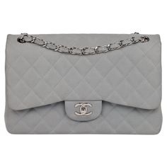 Chanel Grey Quilted Caviar Suede Jumbo Classic Double Flap Bag Brand- Chanel Model- Jumbo Classic Double Flap Bag Product Type- Crossbody, Shoulder Serial Number- 17****** Age- Circa 2012 Accompanied By- Chanel Dust Bag Colour- Grey Hardware- Silver Material(s)- Caviar Leather Authenticity Details- Serial Sticker Height- 19cm Width- 30cm Depth- 9cm Strap Drop- Single: 58cm Double: 32.5cm Interior- Grey Leather Closure- Turn Lock Country of Origin- Italy Condition Rating- Excellent Exterior Condi Chanel Model, Classic Flap, Flap Bag, Grey Leather, Fashion Handbags, Gold Hardware, Luxury Bags, Light Green, Dust Bag