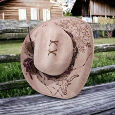 Very pretty Pale Pink Blush colored cowboy - rancher hat. Rodeo themed floral and skull Hat. Has a pretty braided band and  feathers.  Truly an original one-of-a-kind creation. size Large with an elastic band for comfort and to fit from 56 to 59 cm Rodeo Hat, Hat Burning, Hand Burn, Rancher Hat, Skull Hat, Pink Blush, Blush Color, Cowboy Hat, Pale Pink