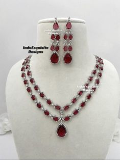 Double layer American Diamond Necklace Set / CZ Necklace/Indian Jewelry/ Reception Jewelry/ Bollywood Jewelry/ Silver red/ 2 two tier necklace  All items are shipped from Brampton, Ontario, Canada. If you need your item by a certain day, please reach out to us for express delivery option so that we can update the shipping for you. We kindly request to consider minor variations in colors, shades, textures as pictures displayed may slightly vary from the actual product due to digital image limitations.Please expect the possibility of some minor imperfections when buying handmade jewelry. Please contact us for any questions you might have. Thank you and Happy shopping 😊 Double Strand Red Jewelry For Party, Red Double Strand Jewelry For Party, Red Double Strand Party Jewelry, Red Double Strand Necklace For Party, Indian Jewelry Silver, American Diamond Necklace Set, Brampton Ontario, American Diamond Necklaces, Tiered Necklace