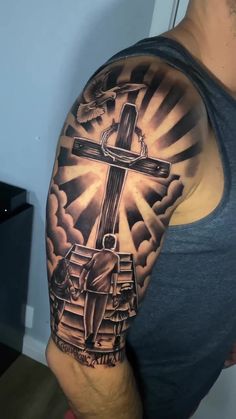 a man with a cross on his arm