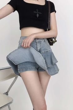 Take any outfit to the next level with this Tiered Pleated Denim Mini Skirt! With its pleated tiers and lightweight denim, you can wear this skirt with a variety of tops and styles. You can pair it with your favorite shirts and blouses or even wear it as is—with its built in short under, you'll stay comfortable all day long. Step out in style by completing the look with flats, sandals, sneakers or boots.
Gender: WomenMaterial: Cotton, Denim, PolyesterLength: Above Knee / MiniWaist: High-WaistClo Y2k Ruffled Bottoms For Summer, Y2k Style Tiered Skirt For Summer, Y2k Tiered Mini Skirt For Summer, Y2k Style Tiered Skirt For Spring, Y2k Tiered Skirt For Spring, Y2k Style Fitted Skort With Ruffles, Y2k Style Ruffled Skort, Y2k Fitted Skort With Ruffles, Y2k Fitted Ruffle Skort