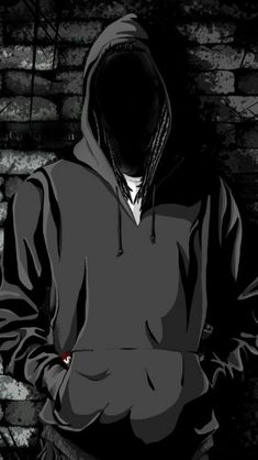 a person wearing a hoodie standing in front of a brick wall with his hands on their hips