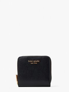 If you love mini bags our Morgan compact wallet is your new BFF. We made it in scratch-resistant Saffiano leather so it will keep its sleek luxe look. | Kate Spade Morgan Small Compact Wallet, Black Compact Kate Spade Wallet, Kate Spade Compact Wallet For Everyday, Compact Kate Spade Coin Purse, Classic Compact Kate Spade Wallet, Kate Spade Compact Everyday Wallet, Kate Spade Classic Compact Wallet, Kate Spade Leather Wallets As Gift, Chic Kate Spade Wallets With Interior Card Slots, Chic Kate Spade Wallet For Travel