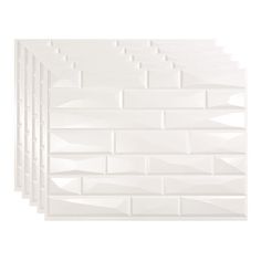 five pieces of white glass tile on a white background