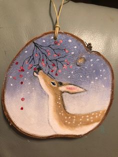 a deer ornament hanging on a wall