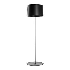 a floor lamp with a black shade on it