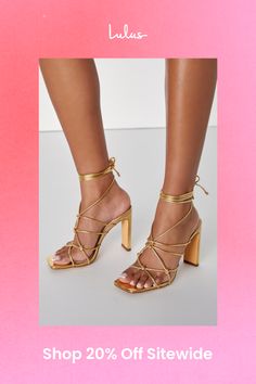 The Lulus Rinay Gold Strappy Lace-Up High Heel Sandals are exactly what your going-out 'fits have been missing! Shiny faux leather shapes these flirty heels that feature a trendy square footbed and single sole silhouette. Knotted ties create a strappy upper that houses long laces (with gold aglets) that wrap around and tie above the ankle. A sleek blade heel completes the look! 4" wrapped blade heel. Cushioned insole. Rubber sole has nonskid markings. Man made materials. Imported. Lulus | Rinay Gold Strappy Lace-Up High Heel Sandal Heels. Gold Sandals With 4-inch Heel For Date Night, Gold Sandals With Wrapped Heel For Date Night, Gold Sandals With Padded Heel For Date Night, Trendy Gold Block Heel Shoes, Glamorous Gold Heels For Date Night, Gold Synthetic Ankle Strap Heels, Gold Ankle Strap Heels With Synthetic Material, Gold Ankle Strap Heels In Synthetic Material, Trendy Gold Party Sandals