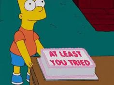 a person standing in front of a cake with the words at least you tried