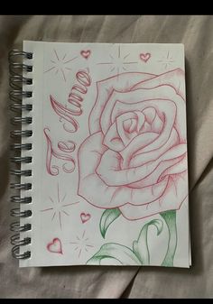 a drawing of a rose with the word love written in cursive writing on it