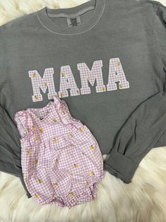 Seriously obsessed! The perfect way to hold those baby outfits close to your heart. You will ship us your outfit(s) and we will use those as the fabric for the MAMA print.  ❤️  Ordering process: 1. Complete order details in personalization box and drop downs 2. Place Order 3. You will receive our address for shipment within 24 business hours of purchase, if purchased on the weekend it will be sent Monday  4. Mail outfit(s) - PLEASE KEEP tracking number as we are unable to individually check for Family Matching Soft-washed Cotton Tops, Cute Long Sleeve Embroidered T-shirt, Matching Spring Loungewear Tops, Spring Loungewear Matching Tops, Family Matching Cotton Tops For Spring, Family Matching Cotton Tops For Loungewear, Cute Long Sleeve Soft-washed Tops, Family Matching Long Sleeve Letter Print Tops, Spring Family Matching Long Sleeve Tops