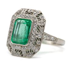 The Daphne ring was handmade in platinum and centers one natural Colombian emerald that weighs 2.70ctw which is surrounded by 76 old mine cut diamonds of H color and VS1 clarity that weigh 0.70ctw. This ring is currently size 7 and can be sized. Total weight: 6.3 grams/ 4dwt Ring measurement: 19mm by 16mm by 7mm Antique Emerald Ring, Art Deco Emerald Ring, Doing The Right Thing, Emerald And Diamond Ring, Colombian Emeralds, Shiny Things, Deco Jewelry, Emerald Jewelry, I Love Jewelry