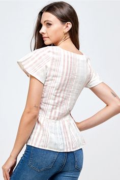 • Made in India • Fabric: 100% Cotton

MODEL IS 5'10" AND IS WEARING A SMALL. Casual Cotton Peplum Top For Spring, Feminine Striped Summer Tops, Feminine Striped Tops For Summer, Fitted Cotton Casual Peplum Top, Jumpsuit And Cardigan, India Fabric, Frill Tops, Jumpsuit Skirt, Short Sleeve Mini Dress