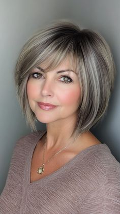 Stylish Short Hairstyles for Women Over 50 Bob With Layers And Bangs, Short Bob With Layers, Voluminous Bob, Bangs Round Faces, Bob With Layers, Angled Bob Hairstyles, Textured Haircut, Gorgeous Gray Hair, Layers And Bangs