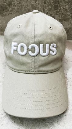 Baseball Cap Hat Cotton Twill in Beige, Black, Navy, Gray, Khaki. 
Looking for a stylish, versatile, and sustainable hat? Our Focus 3D Puff Embroidered Baseball Cap is the perfect choice! Featuring a unique reverse "C" design on the word "Focus," this trendy cap stands out from the crowd like a custom hat. Made from 100% organic cotton, it's eco-friendly and perfect for anyone who values sustainability.
This all season hat is for everyone; men's hat, women hat, men's cap, unique hat, hat outfit Sports Cotton Trucker Hat With Letter Print, Sporty Cotton Snapback Hat With Letter Print, Sporty Cotton Hat With Letter Patch, Sporty Cotton Hat With Letter Print, Cotton Snapback Hat With Letter Print For Sports, Sports Cotton Snapback Hat With Letter Print, Sporty Cotton Baseball Cap With Letter Patch, Cotton Dad Hat With Letter Print For Sports, Sports Cotton Dad Hat With Letter Print