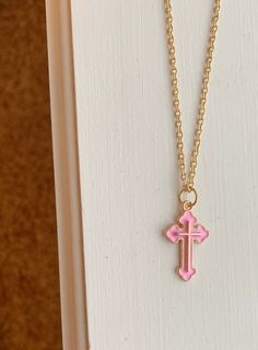 Preppy pink cross necklace! More colors coming soon! Pink Pendant Necklace With Clavicle Chain, Pink Cross-shaped Jewelry Gift, Pink Cross-shaped Jewelry For Gift, Adjustable Pink Pendant Charm Necklaces, Adjustable Pink Cross-shaped Jewelry, Pink Cross Pendant Jewelry As Gift, Pink Cross Pendant Necklace For Gift, Adjustable Clavicle Chain Cross Necklace, Pink Cross Necklace For Gift