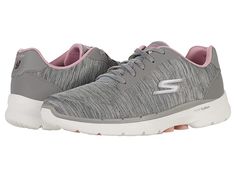 SKECHERS Performance Go Walk 6 - Magic Melody - Women's Shoes : Gray/Pink : You'll catch these amongst your favorites! The SKECHERS Performance Go Walk 6 - Magic Melody featuring a classic lace-up style running sneaker constructed with a well bedded footbed for all day wear. Textile upper. Textile lining and insole. Synthetic outsole. Imported. Measurements: Weight: 8 oz Product measurements were taken using size 9, width B - Medium. Please note that measurements may vary by size. Weight of foot Comfortable Gray Lace-up Running Shoes, Boost Midsole Lace-up Running Shoes, Gray Lace-up Sneakers, Comfortable Gray Running Shoes For Sports, Comfortable Synthetic Running Shoes With Laces, Comfortable Gray Running Shoes With Athletic Fit, Casual Running Shoes With Branded Insole, Comfortable Athletic Fit Gray Running Shoes, Gray Comfortable Athletic Fit Running Shoes