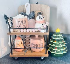 a shelf with christmas decorations on top of it