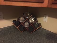 a stack of pots and pans sitting on top of a counter